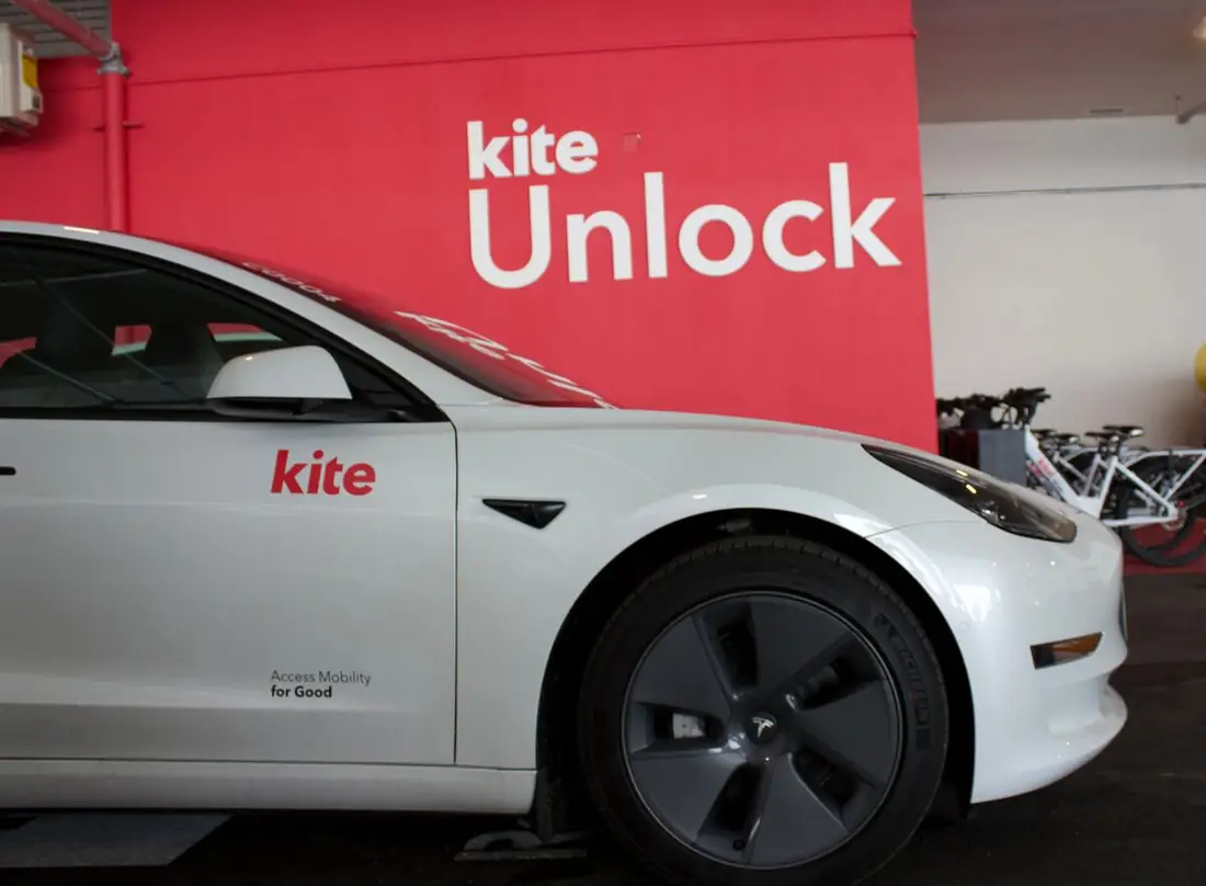 A Kite car parked at the The Selby hub by the Kite Unlock wall